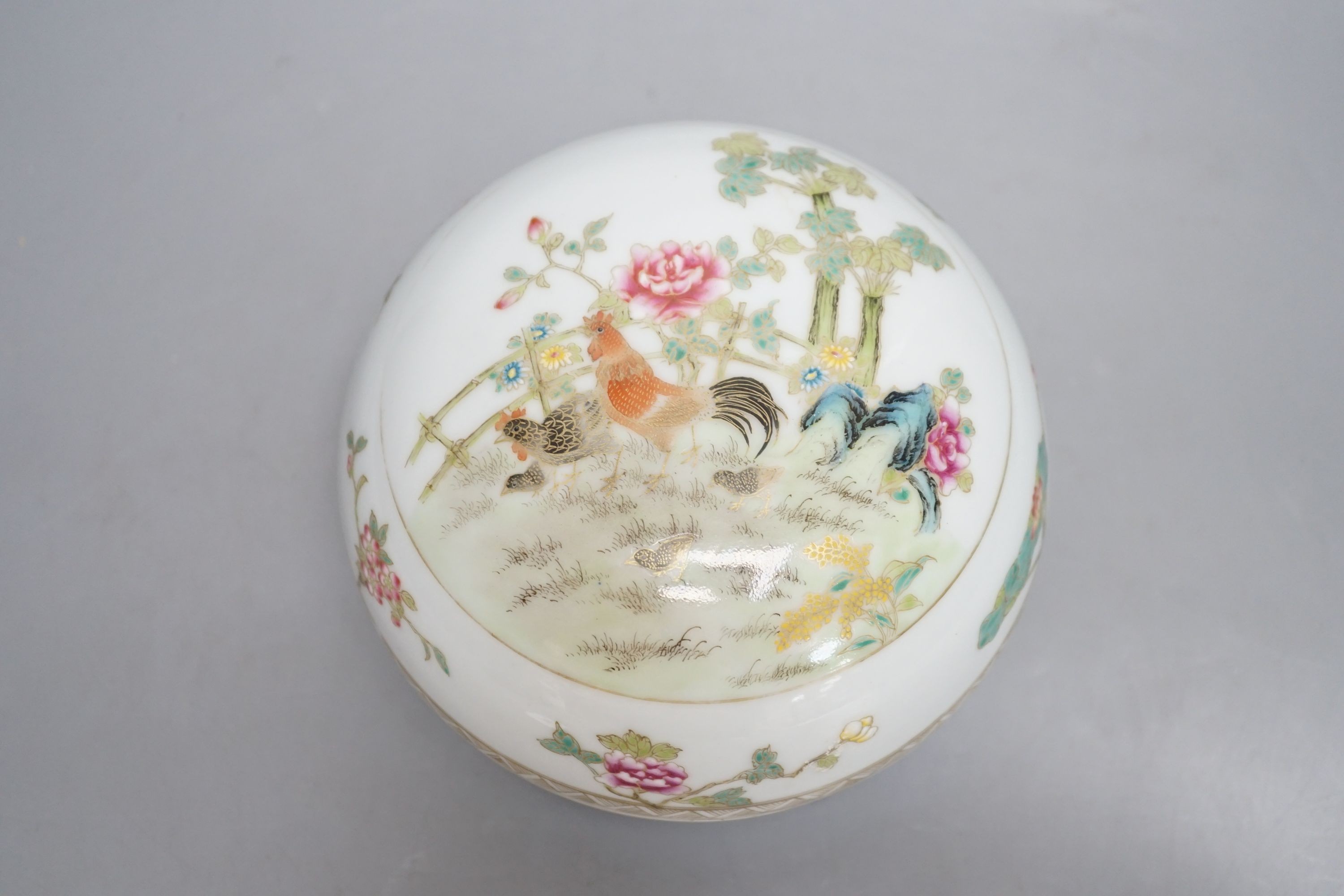 A Chinese famille rose’chickens’ box and cover, possibly Republic period, with mark, 13cms high.